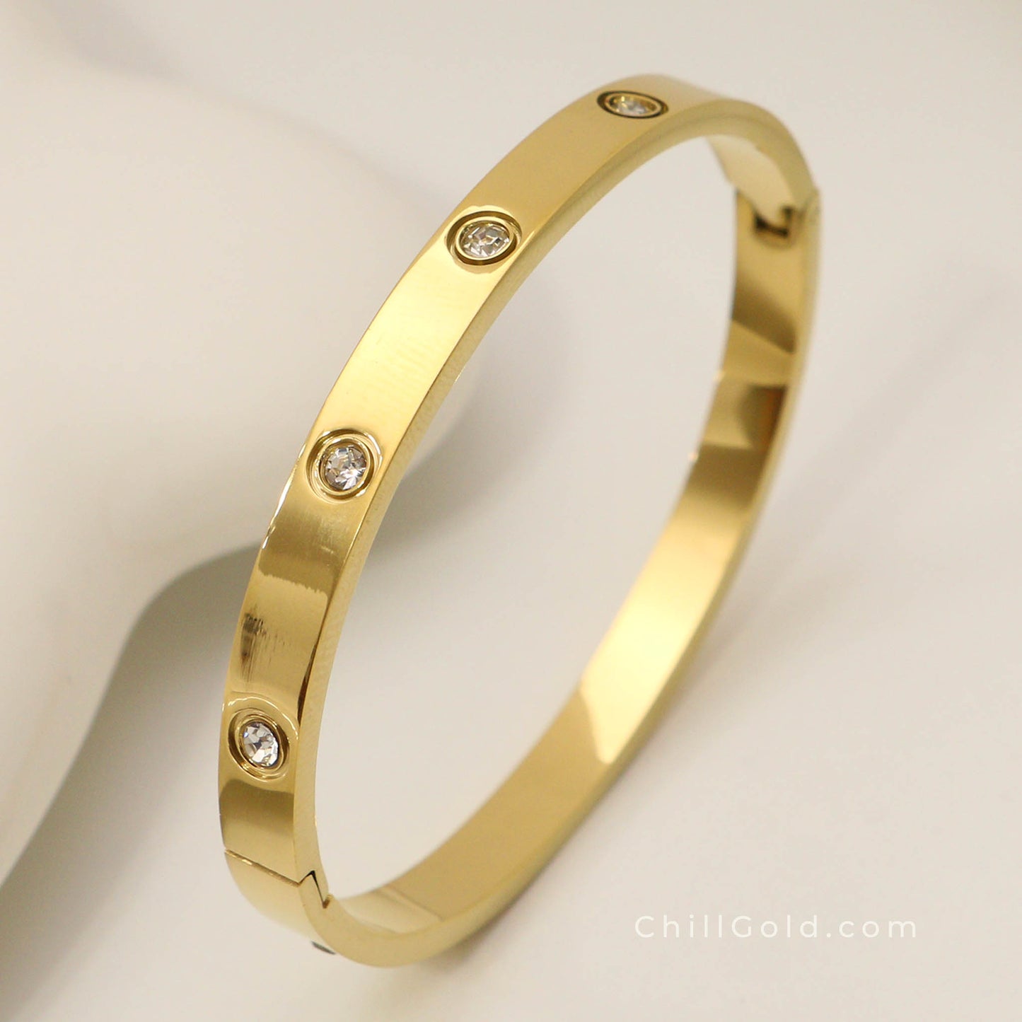 Golden Sparkle 18K Gold Plated Cubic Zirconia Hinged Bangle