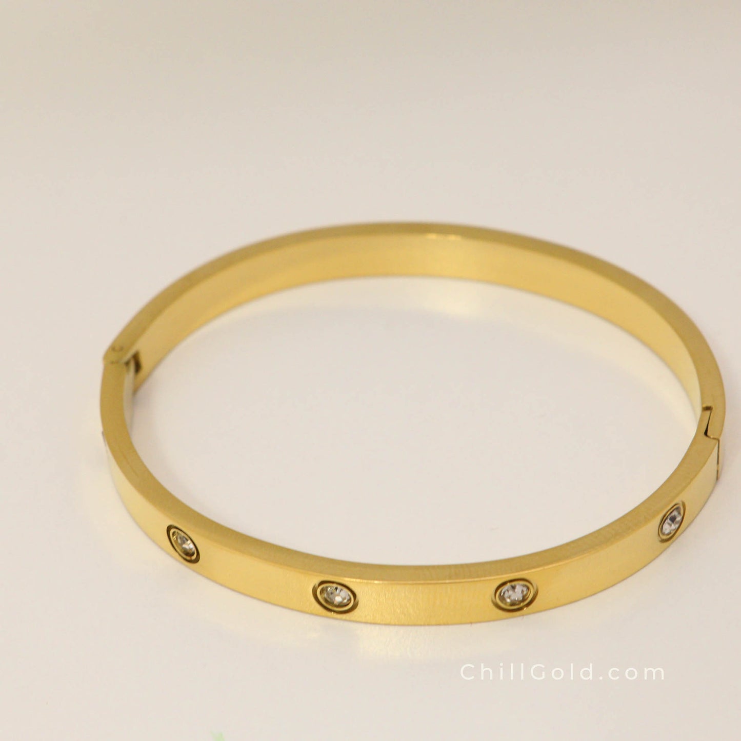 Golden Sparkle 18K Gold Plated Cubic Zirconia Hinged Bangle